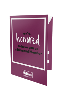Hilton Honors Diamond key packet in purple with white border and “we’re honored to have you as a Diamond Member
